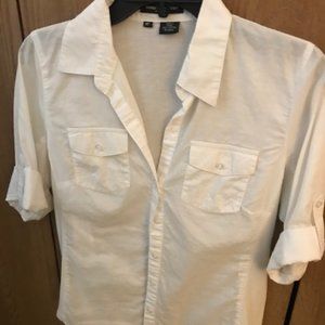 White casual button-down shirt with roll-up sleeve